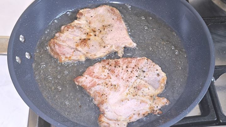 Fried Pork Shoulder Slices in the Pan