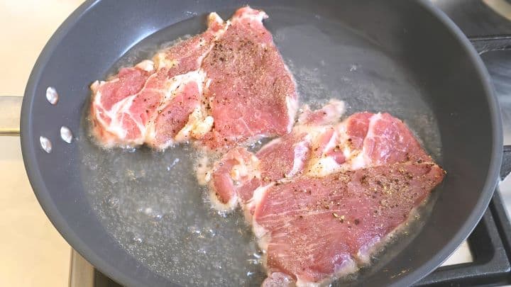 Frying Pork Shoulder Slices in the Pan
