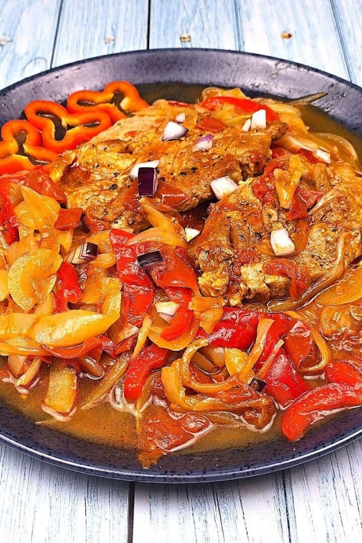 Hungarian Pork Pepper Stew Served on Blue Plate
