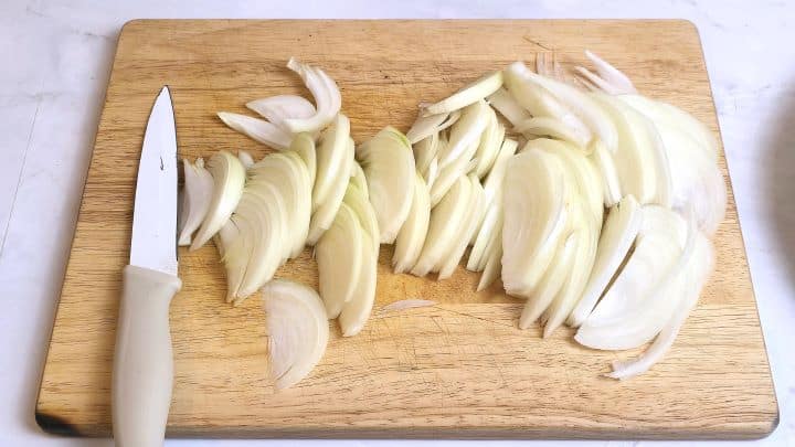 Sliced Onions on the Chopping Board