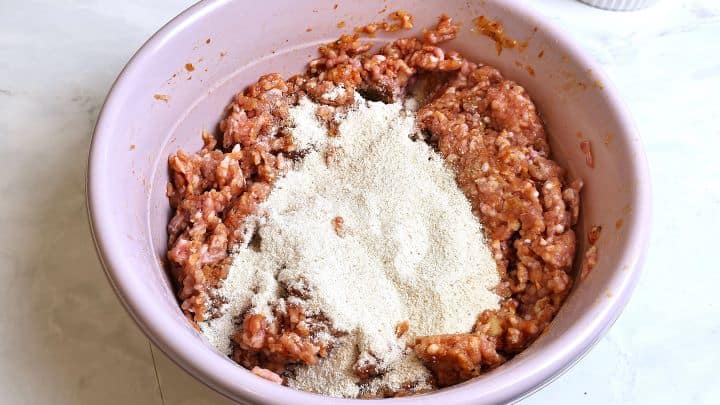 Breadcrumbs on Seasoned Pork Mince in the Bowl