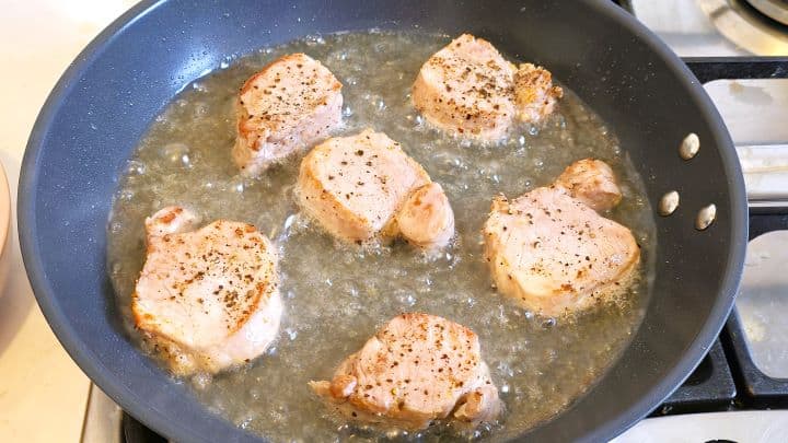 Fried Pork Tenderloin Slices in the Pan