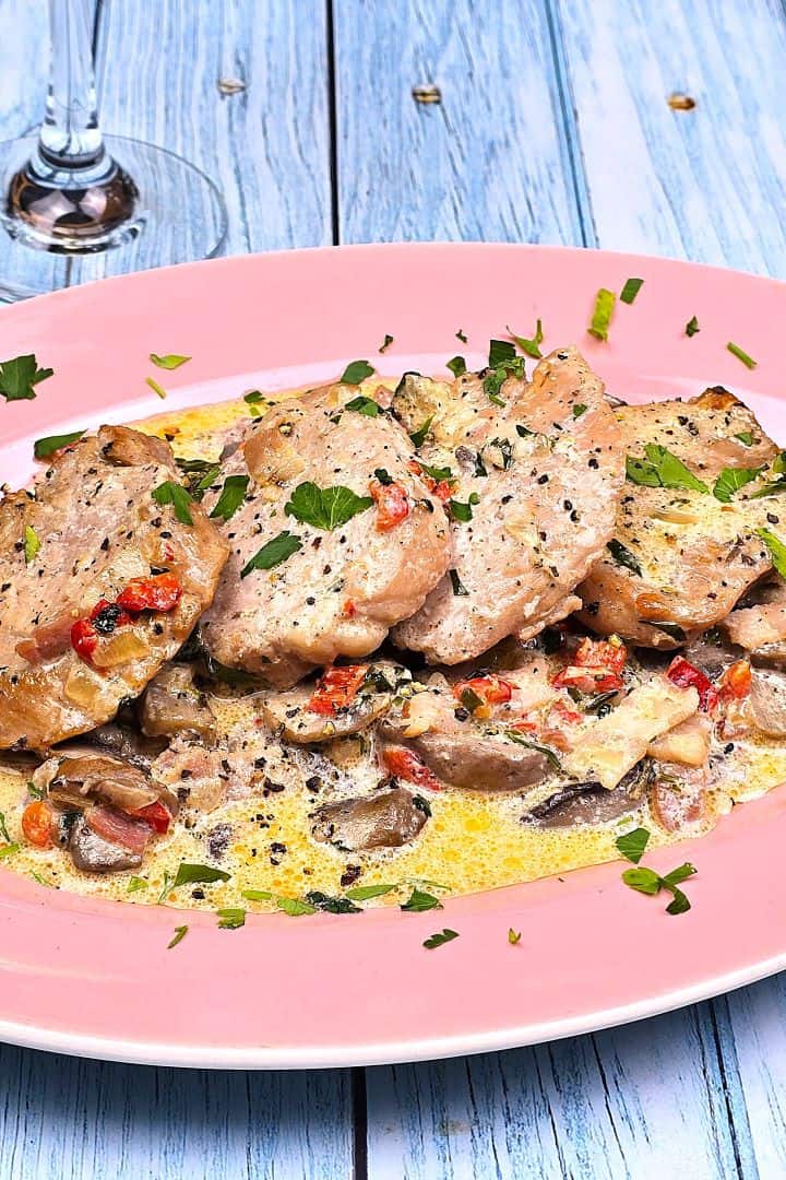 Pork Tenderloin in Creamy Mushroom Sauce Served on Oval Plate
