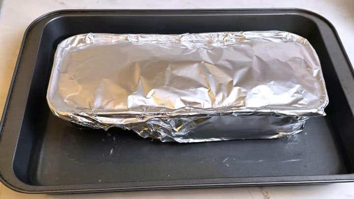 Foil Covered Loaf Tin in the Oven Tray