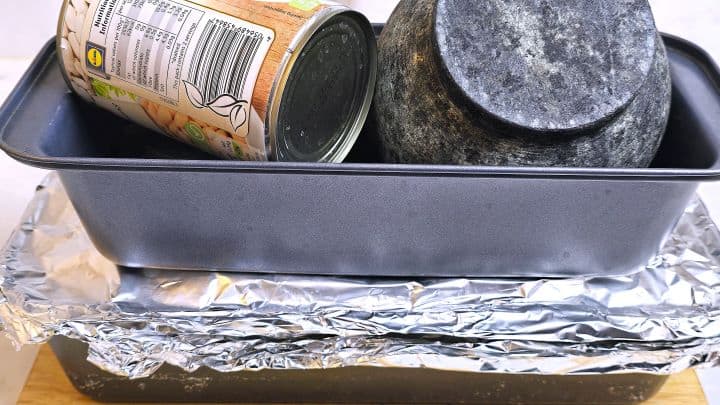 Heavy Items on the Cooked Spam on the Loaf Tin