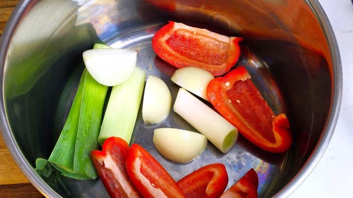 Cut Onion, Bell Pepper, and Leek in the Pot