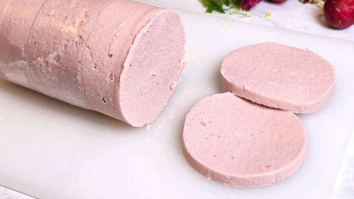 Two Homemade Turkey Bologna Slices on the Chopping Board