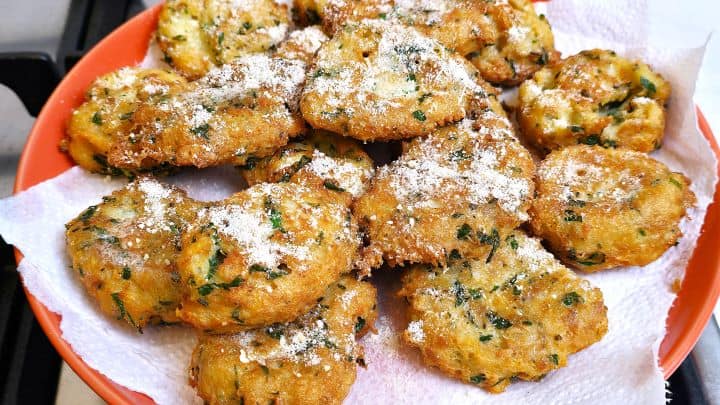 Fried Polpette di Pane With Parmesan on Top on the Plate