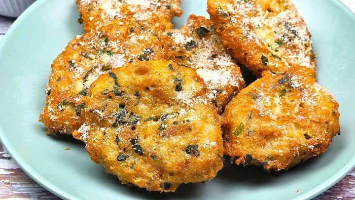 Six Italian Bread Balls Served on Green Plate