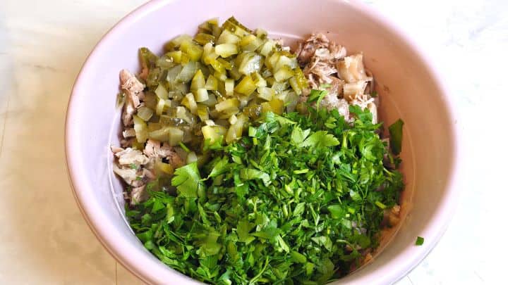 Chopped Knuckle Meat, Parsley, and Pickled Cucumber in a Bowl