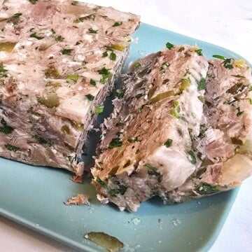 Homemade Head Cheese Sliced and Served on a Plate
