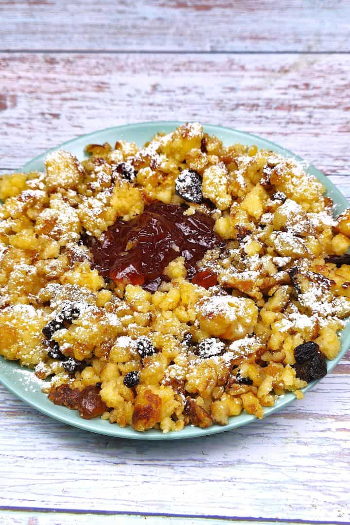 Hungarian Csaszarmorzsa (Shredded Pancake) Served on Plate With Raspberry Jam