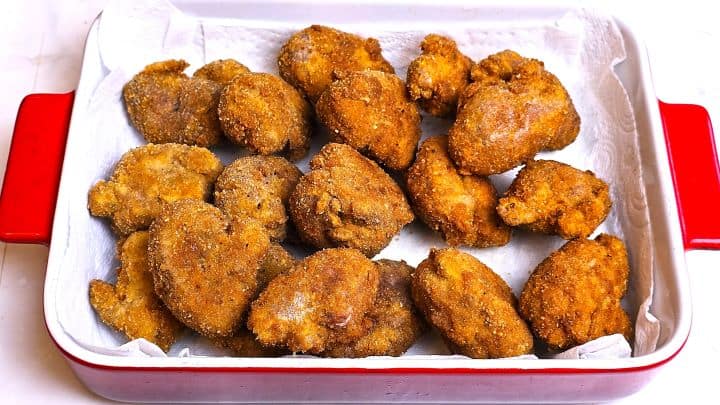 Draining Fried Pork Brains on Paper in the Serving Dish