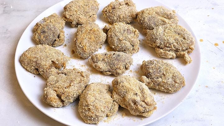 Pork Brains Coated in Flour, Eggs, and Breadcrumbs Before Frying