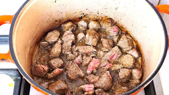 Diced beef browned on all sides in the Dutch oven.
